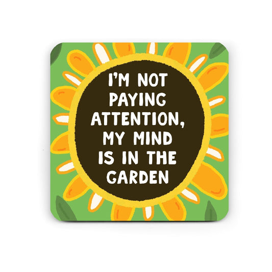 Square coaster with sunflower design and text on a white background