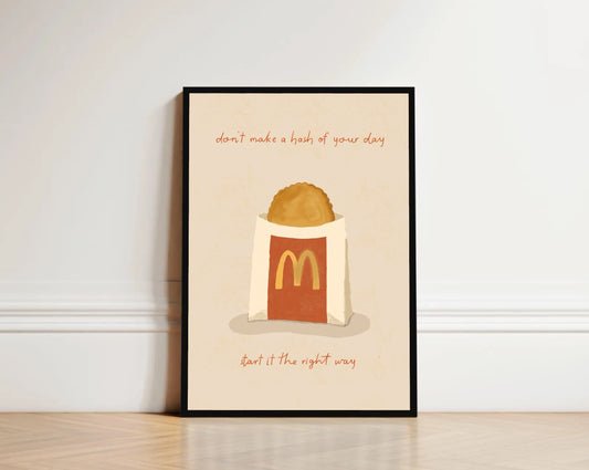 Framed poster with McDonald's logo and text on a beige background