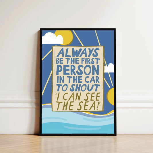 Framed poster with motivational quote on a wall